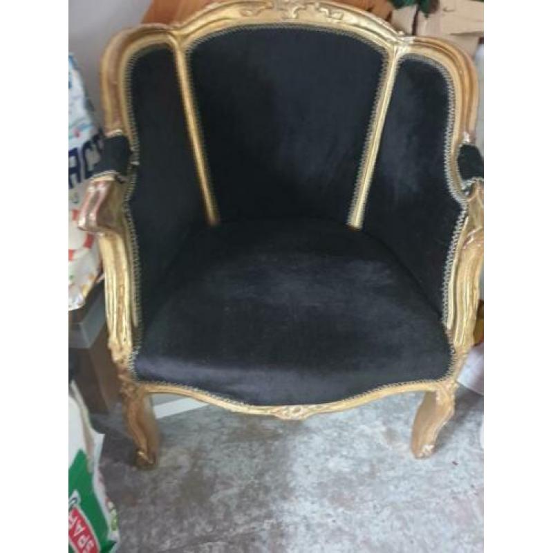 barok fauteuil goud met zwart fluweel.