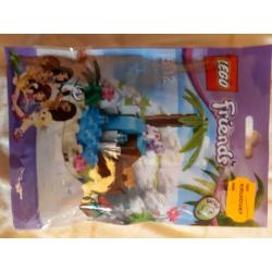 Twee zakjes legofriends en twee doosjes lego